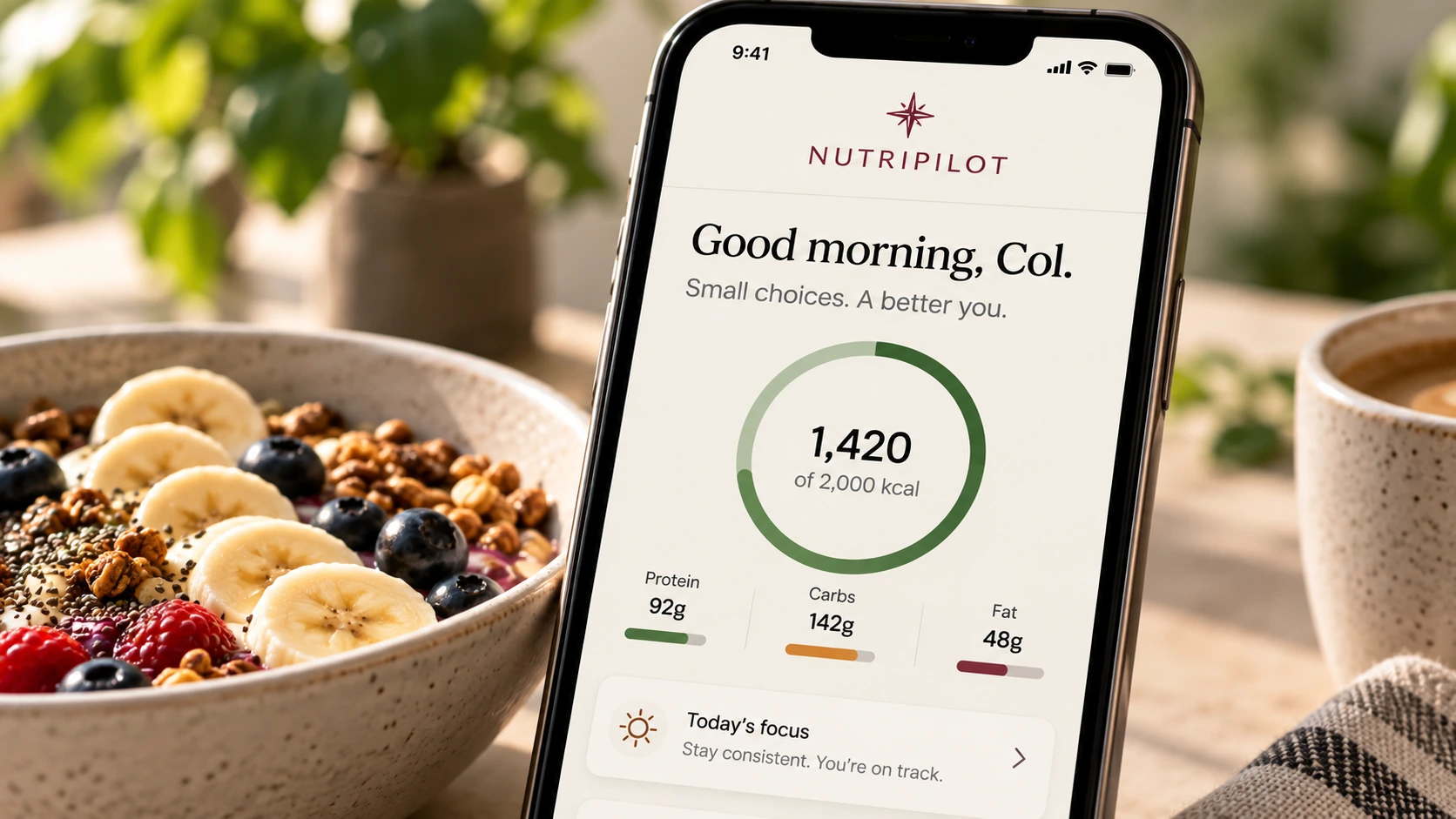 NutriPilot app beside a breakfast bowl in warm morning light